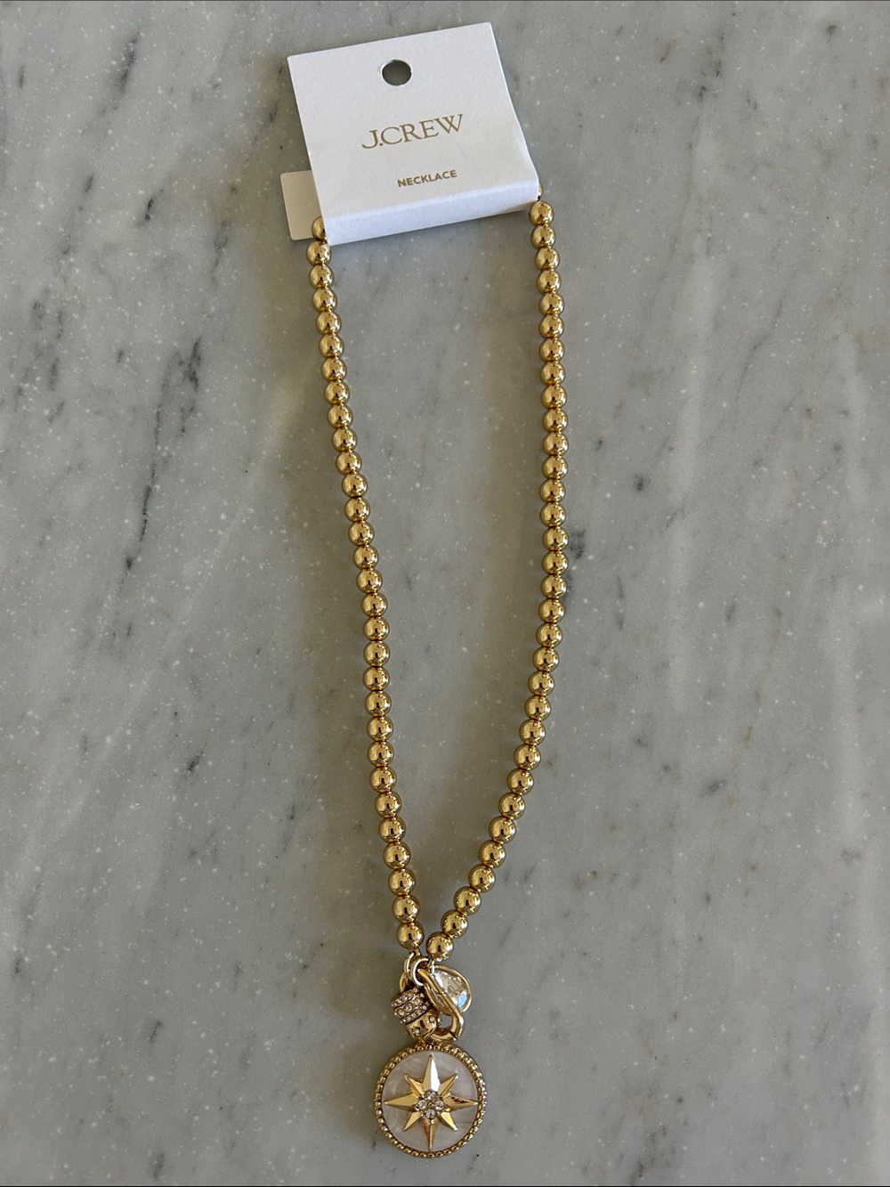 J. Crew Gold Beaded Necklace with Star Compass Pendant